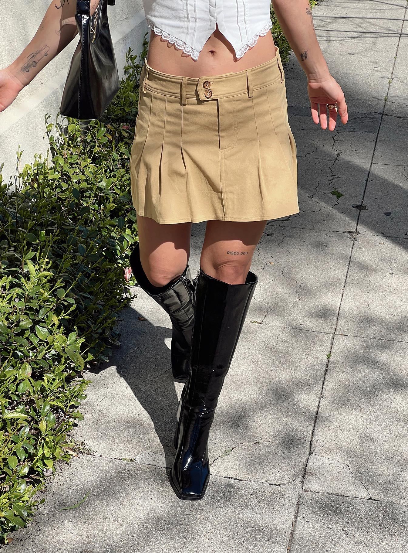 Amira Mini Skirt Beige sold by Princess Polly