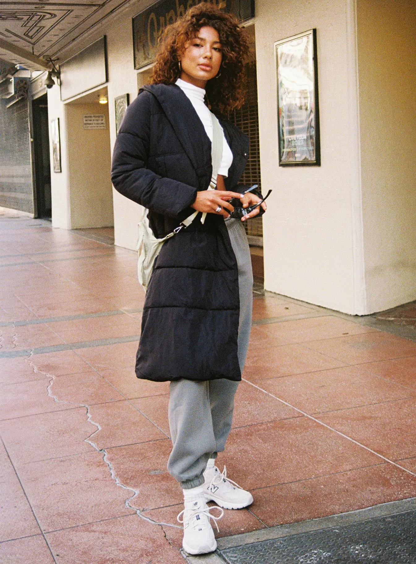 Philo Longline Hooded Puffer Jacket Black sold by Princess Polly