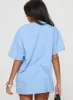 Races 1996 Oversized Tee Blue sold by Princess Polly