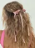 Rosette Bow Hair Clips Pink sold by Princess Polly