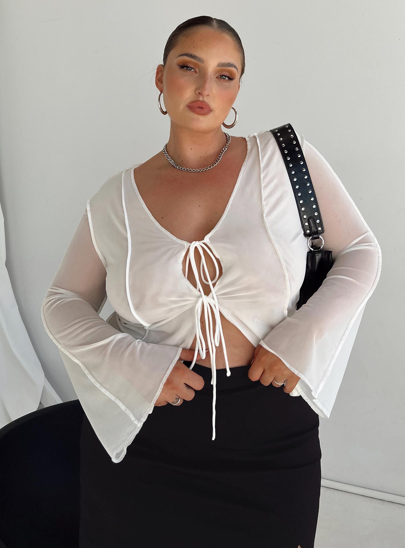 Mereba Long Sleeve Top White Curve sold by Princess Polly