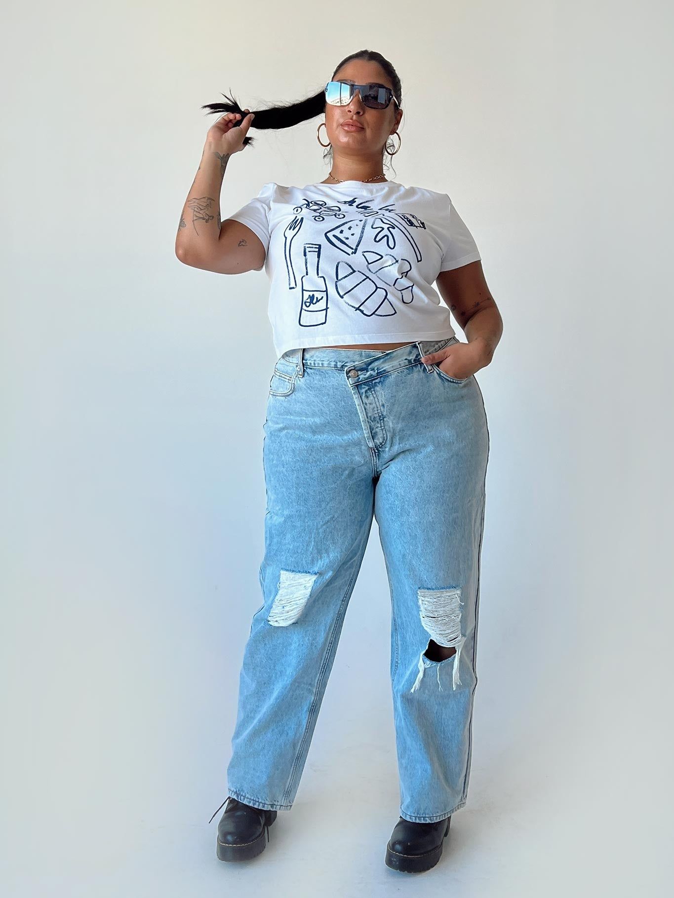 Holly Asymmetric Ripped Leg Jeans Curve sold by Princess Polly