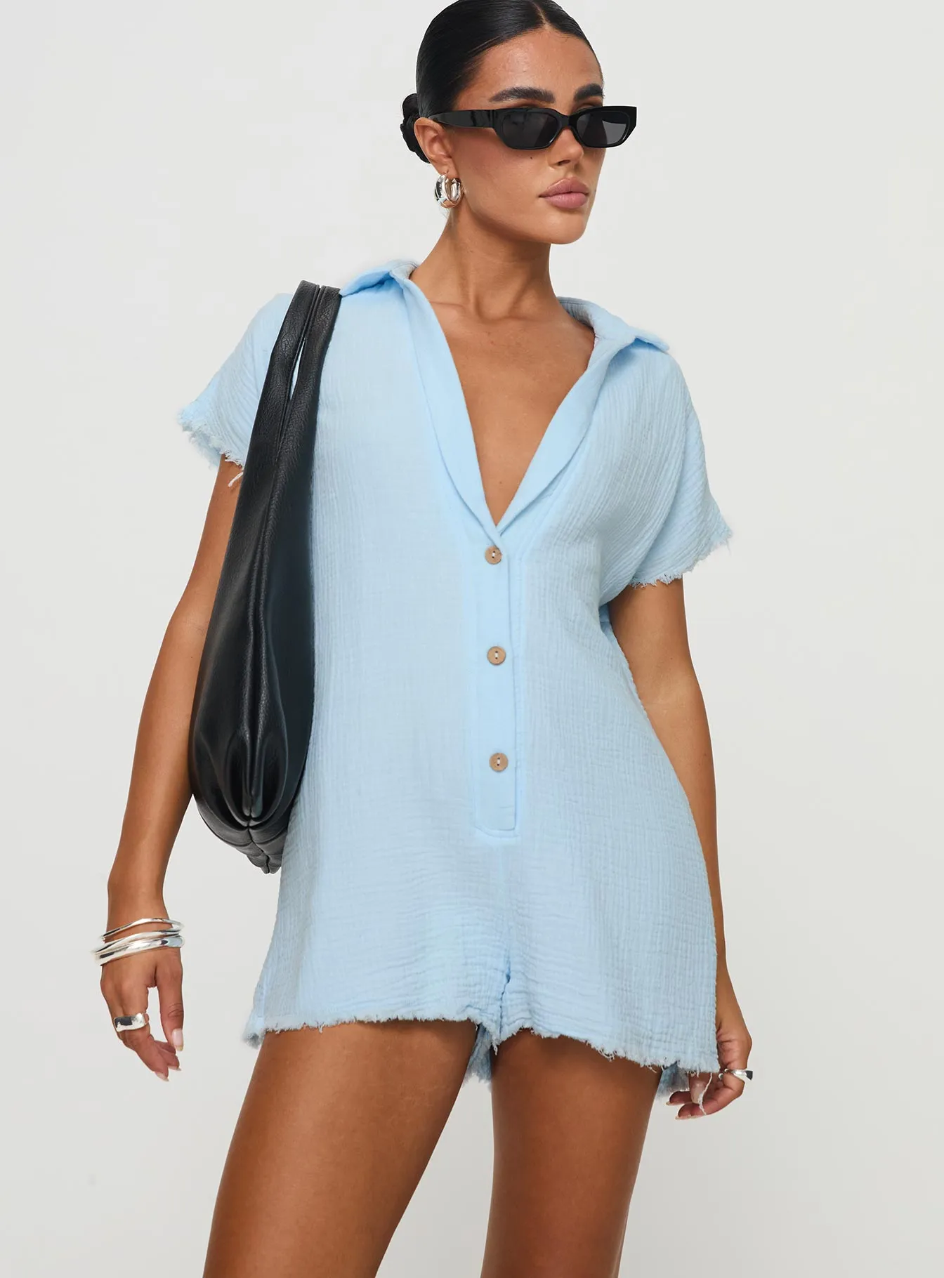 Salt Lake Romper Blue sold by Princess Polly