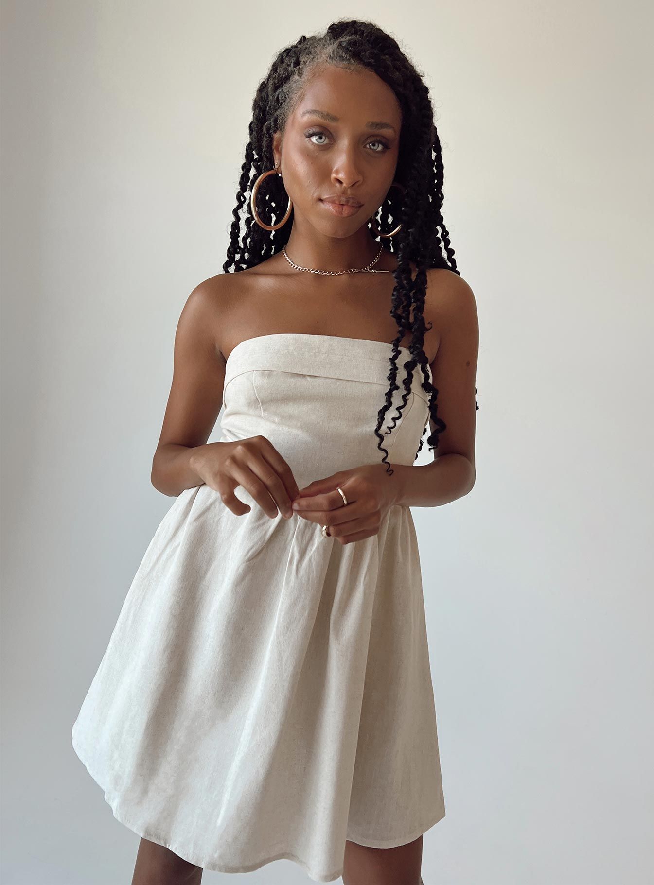Kallie Mini Dress Beige sold by Princess Polly