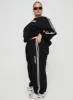 Princess Polly Track Pants Stripe Black / White Curve sold by Princess Polly