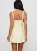 Beacall Mini Dress Lemon sold by Princess Polly