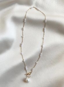 Lenna Necklace Gold / Pearl sold by Princess Polly