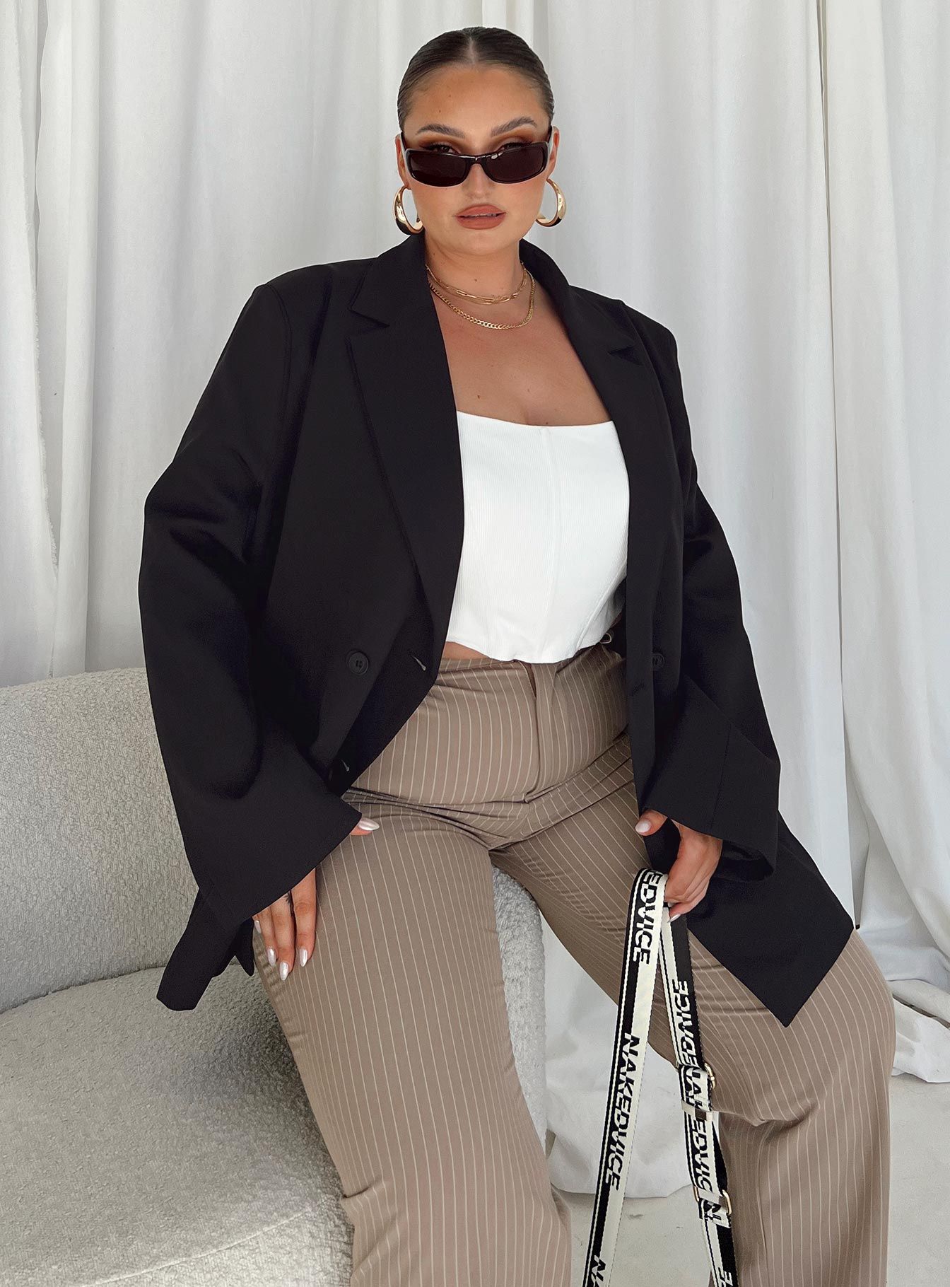 The Ella Blazer Black Curve sold by Princess Polly