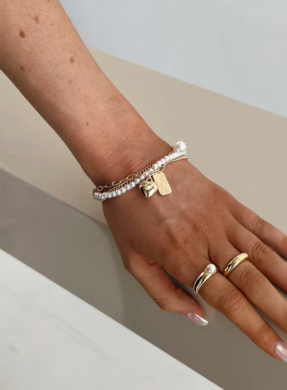 Daintree Charm Bracelet Gold sold by Princess Polly