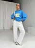 Princess Polly Hooded Sweatshirt Bubble Text Blue / Yellow sold by Princess Polly