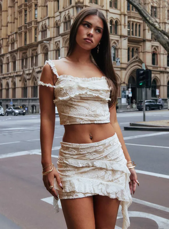 Allise Frill Mini Skirt Cream sold by Princess Polly