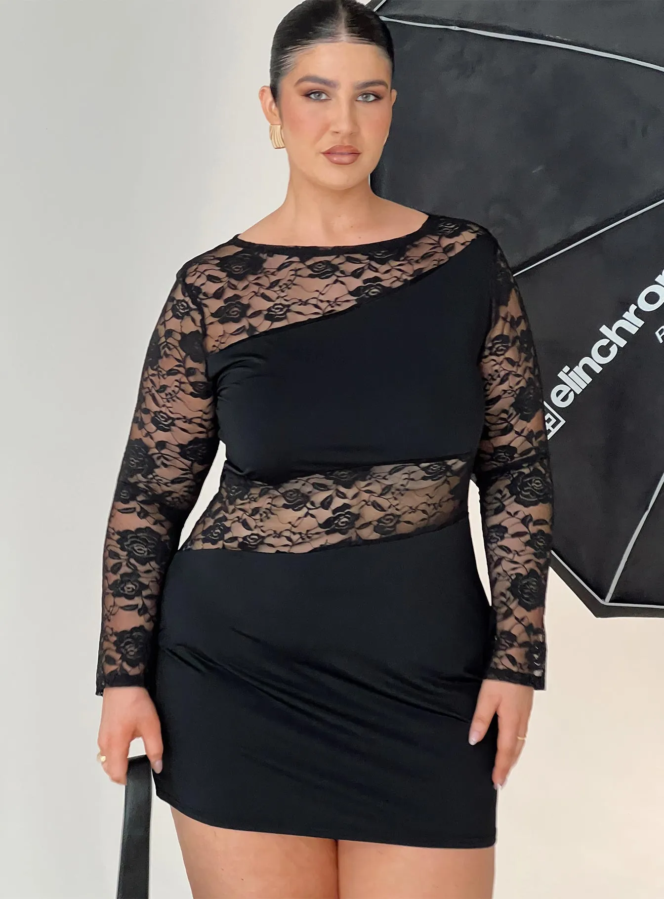 Covington Long Sleeve Mini Dress Black Curve sold by Princess Polly