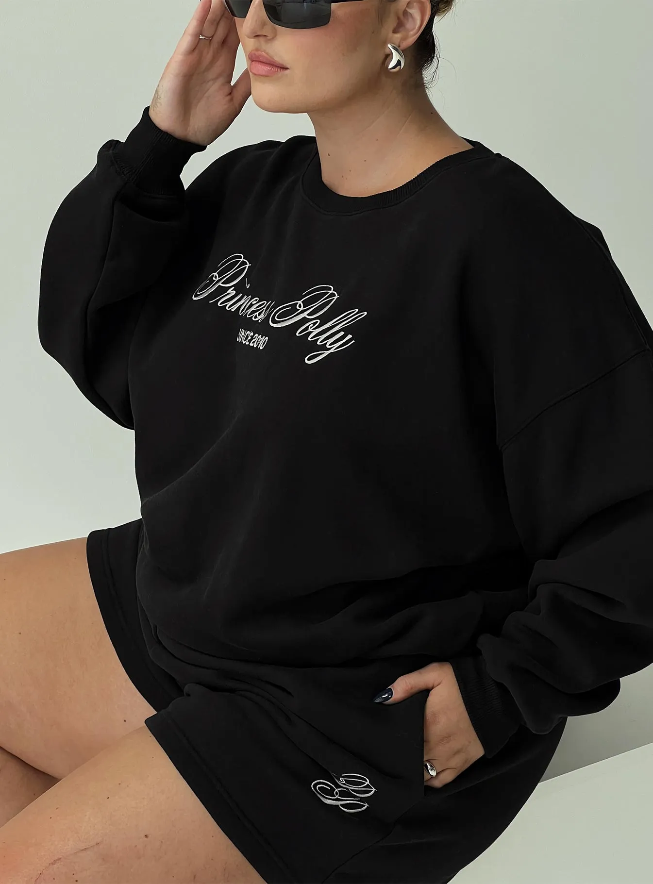 Princess Polly Crew Neck Sweatshirt Cursive Text Black Sand Curve sold by Princess Polly