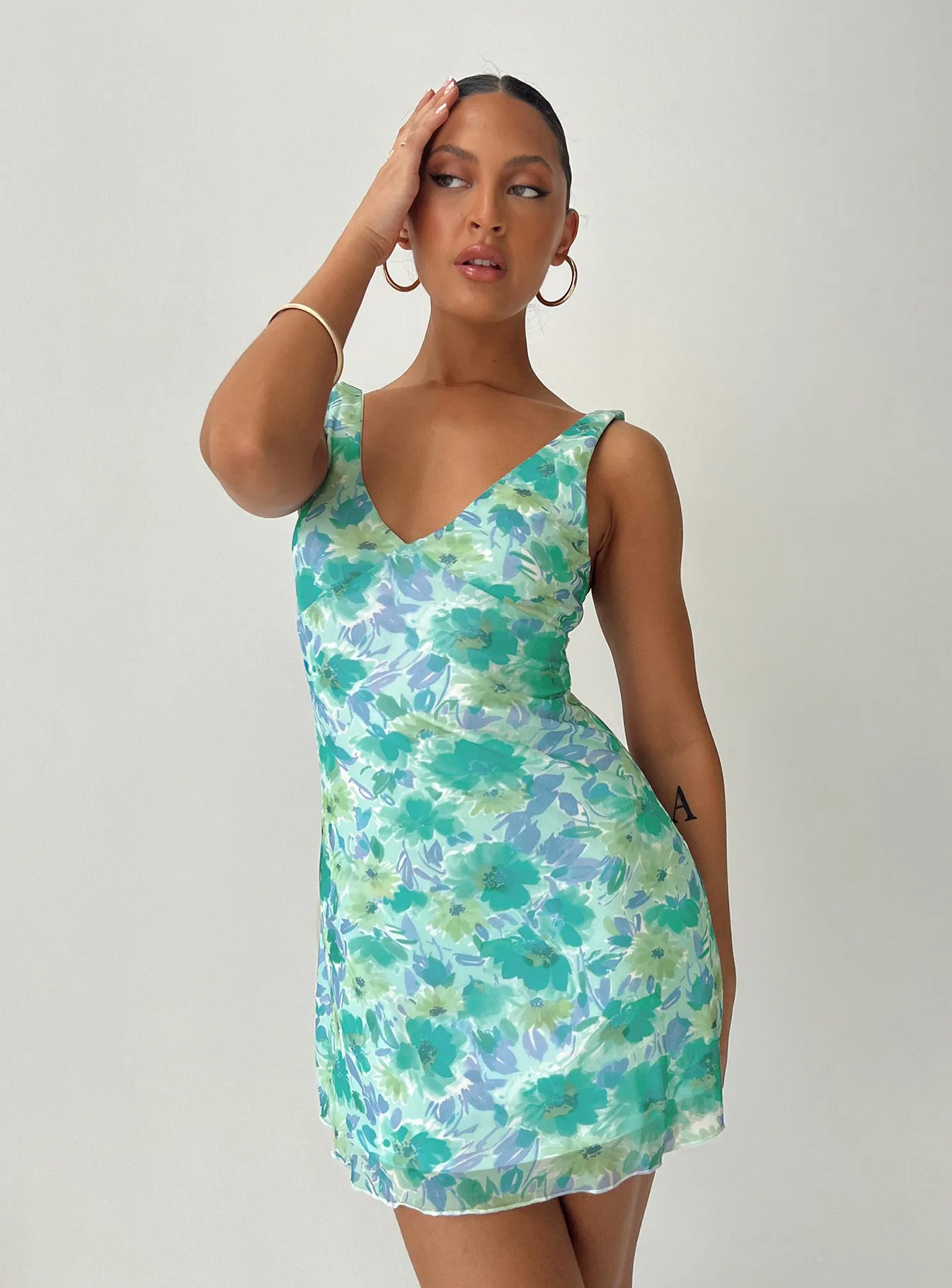 Zuba Mini Dress Green Floral sold by Princess Polly