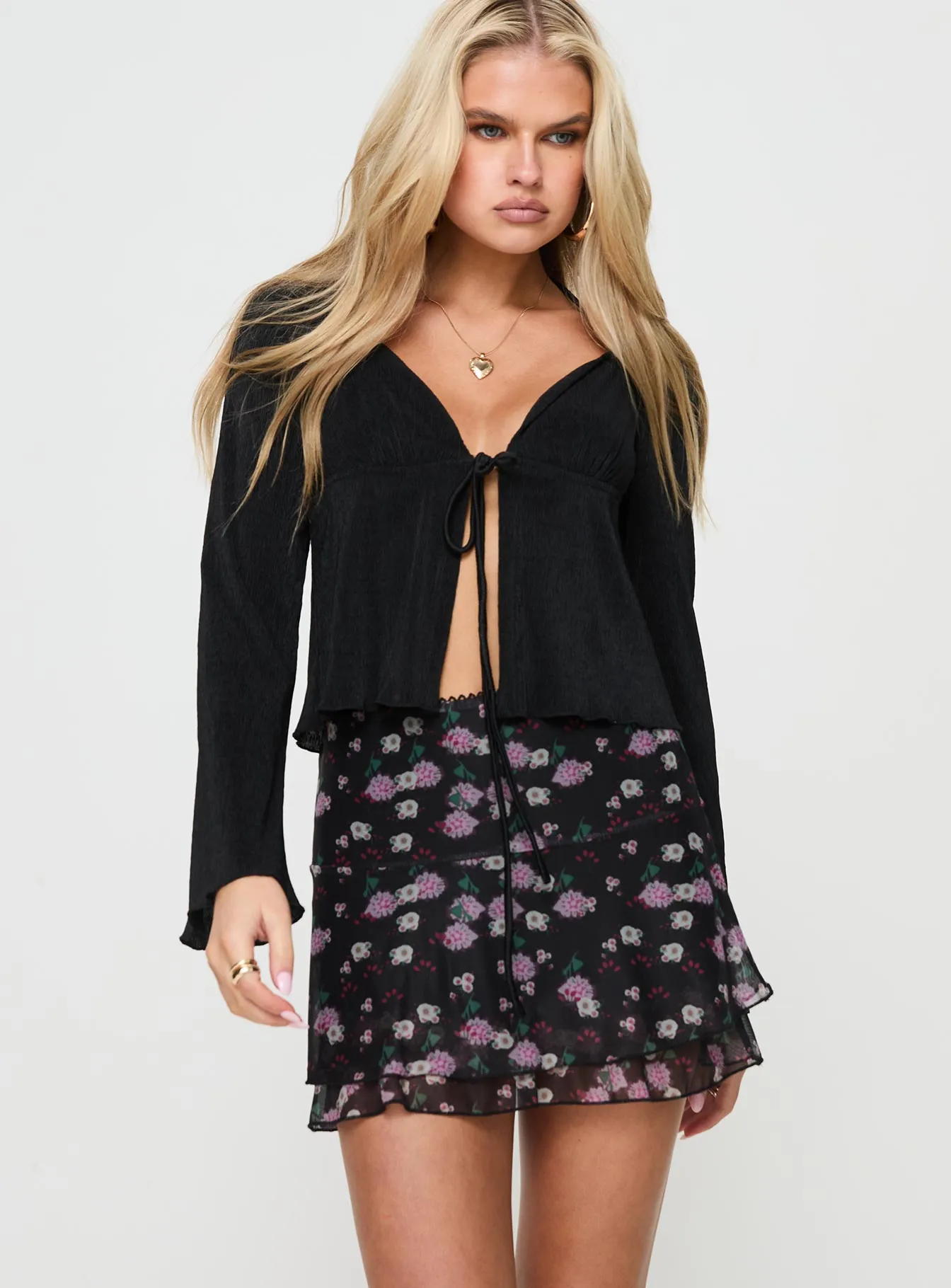 Sunny Skies Mini Skirt Black Floral sold by Princess Polly