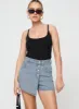 Merthyr Denim Skort Mid Wash sold by Princess Polly