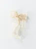 Linney Hair Bow Beige sold by Princess Polly