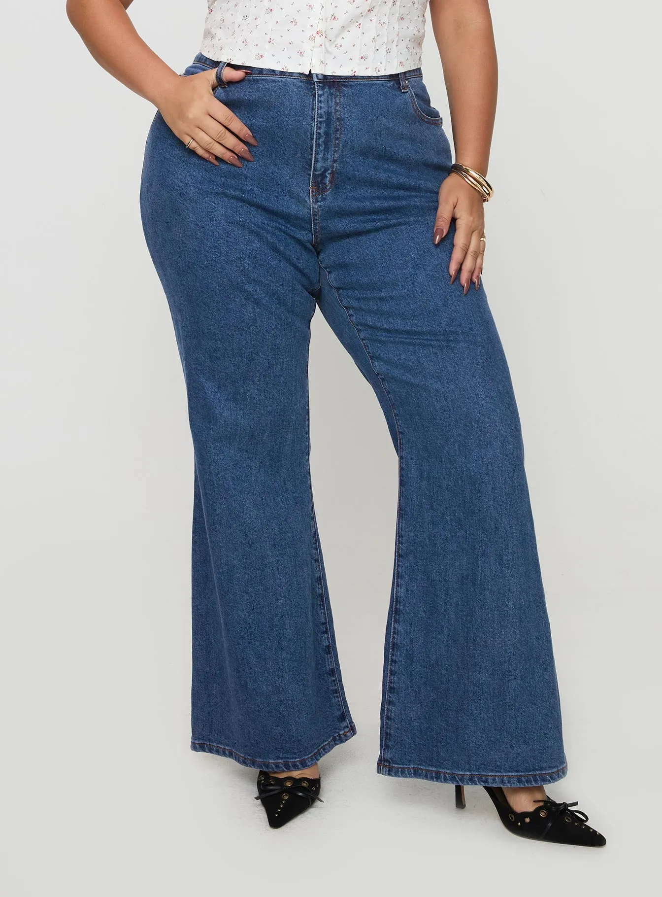 Lucille High Rise Flared Jeans Mid Wash Curve sold by Princess Polly