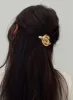 Salacia Hair Clip Gold sold by Princess Polly