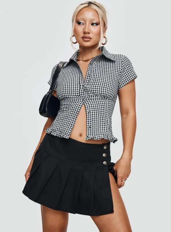 Anubis Pleat Mini Skirt Black sold by Princess Polly