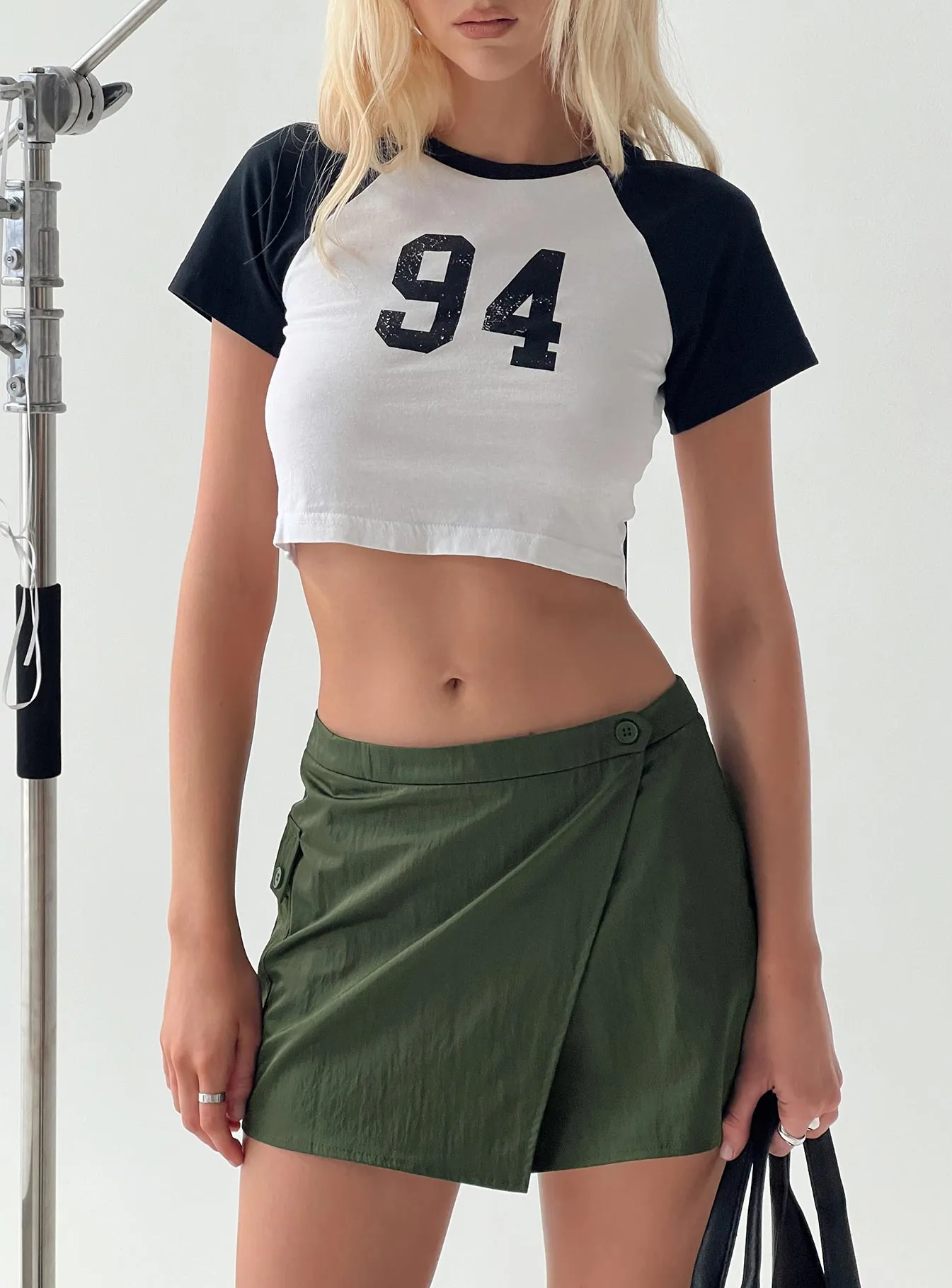 Caran Cargo Mini Skirt Green sold by Princess Polly