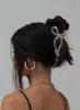 With A Bow Hair Clip Nude sold by Princess Polly