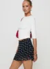 Dapple Bias Mini Skirt Black Polka Dot sold by Princess Polly
