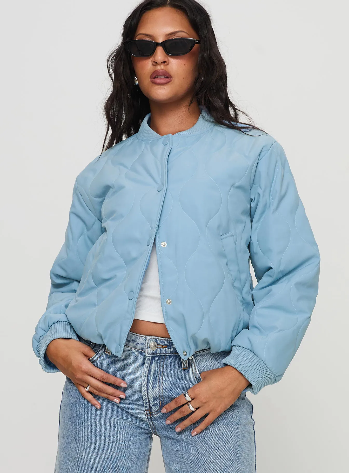 Qwynne Quilted Jacket Blue sold by Princess Polly