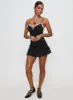 Yves Mini Dress Onyx Polka sold by Princess Polly