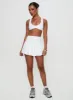 Dynamic Pleat Active Skort White sold by Princess Polly
