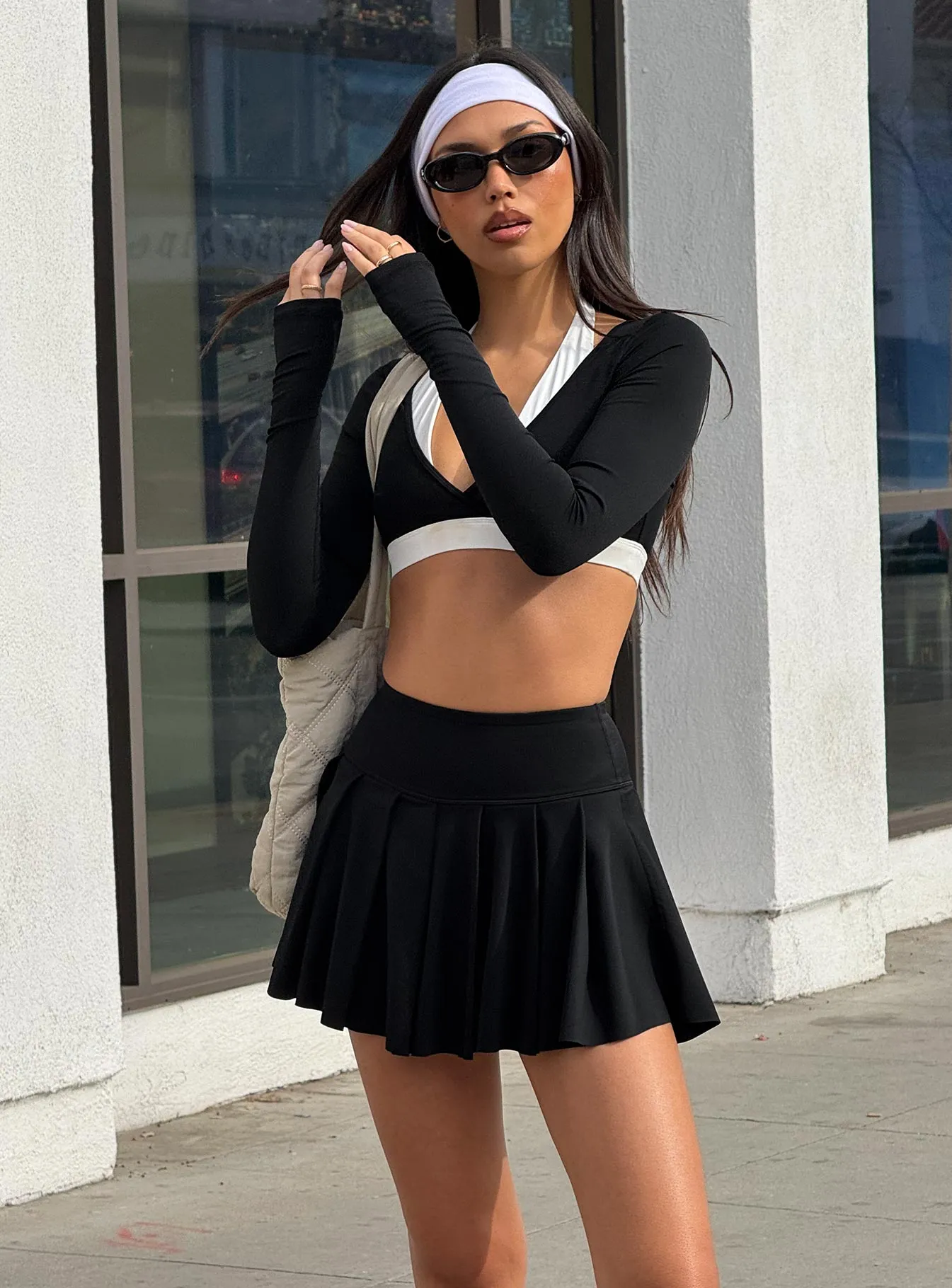 Dynamic Pleat Active Skort Black sold by Princess Polly