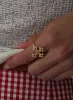 Venette Cross Ring Gold sold by Princess Polly