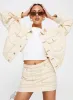 Hughes Mini Skirt Cream Denim sold by Princess Polly