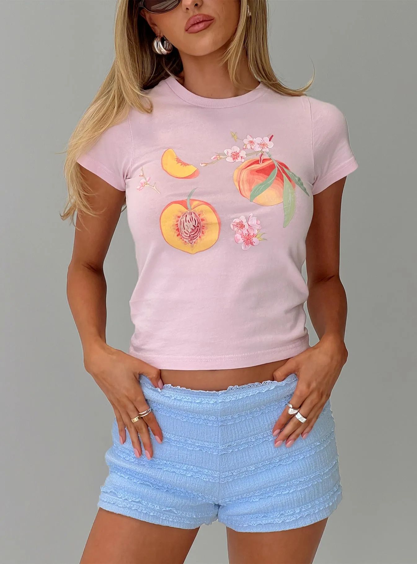 Darlin' Peach Graphic Top Pink sold by Princess Polly