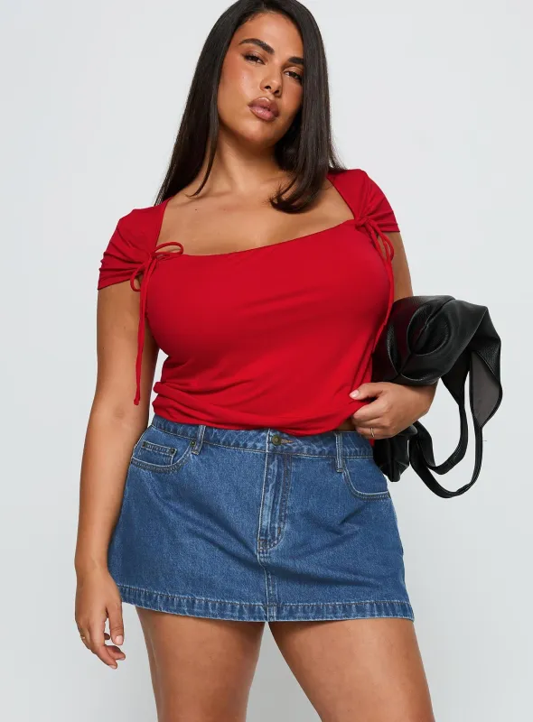 Nicolina Low Rise Denim Mini Skirt Light Wash Curve sold by Princess Polly
