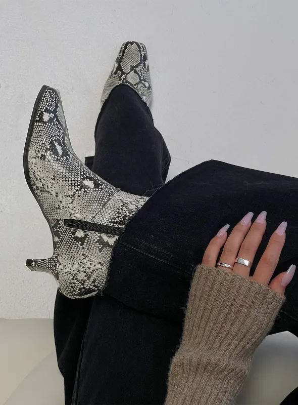 Therapy Shade Boots Black / White Snake sold by Princess Polly