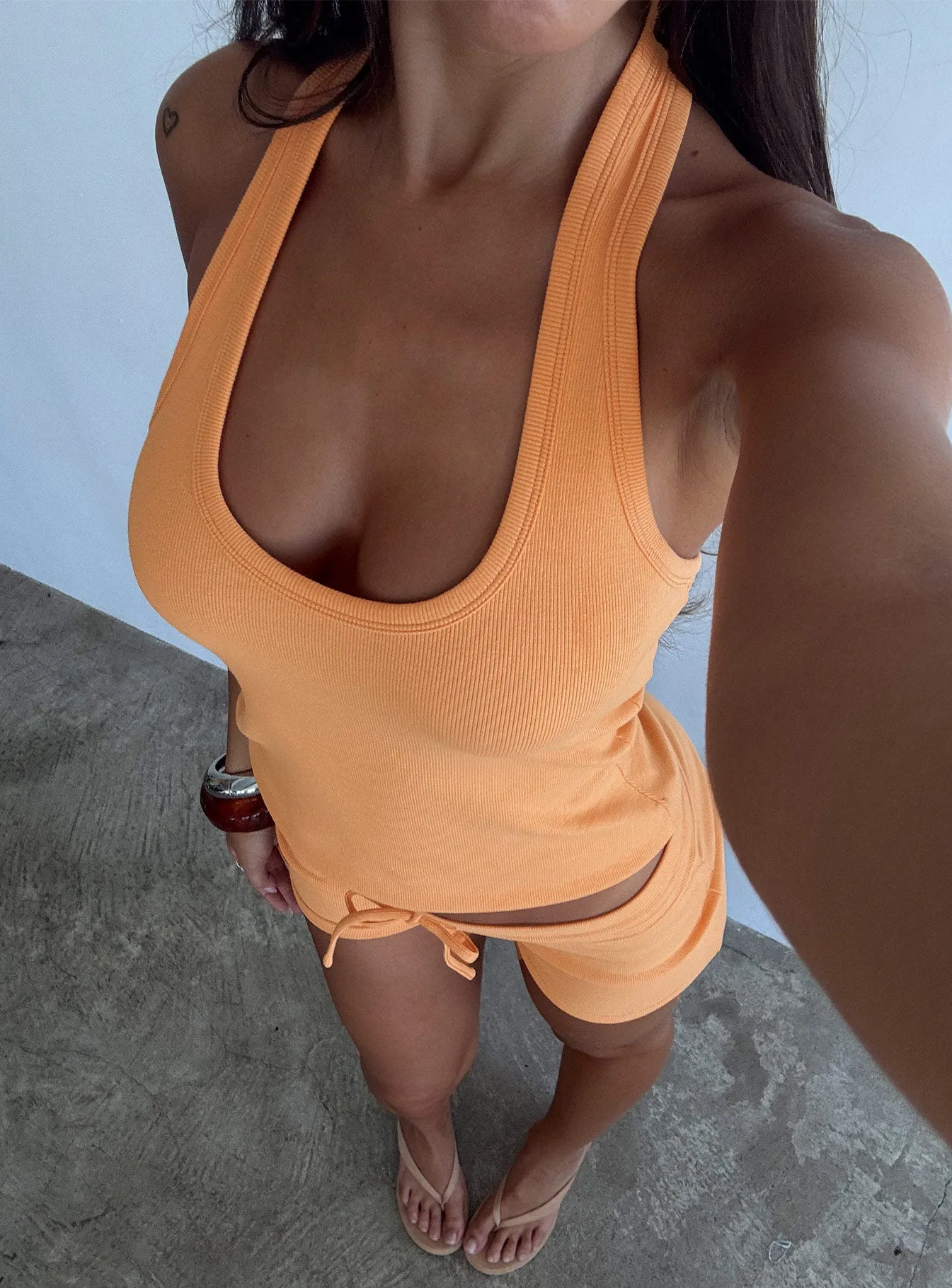 Baseline Scoop Halter Rib Tank Orange sold by Princess Polly