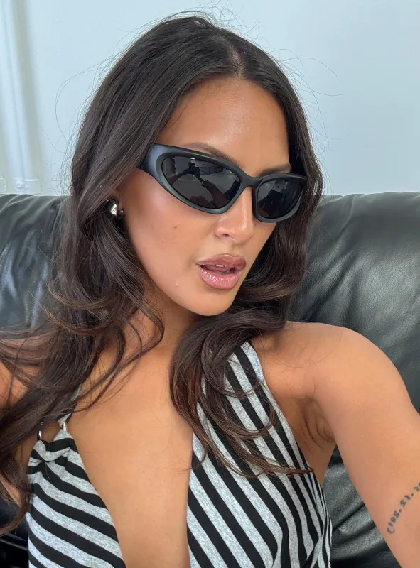 Huxlee Curved Sunglasses Black sold by Princess Polly