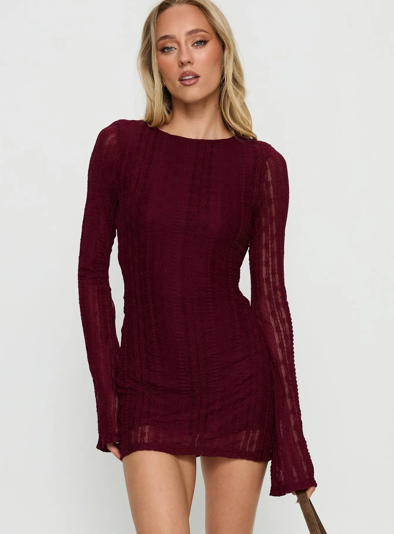 Delandra Long Sleeve Textured Playsuit Red sold by Princess Polly