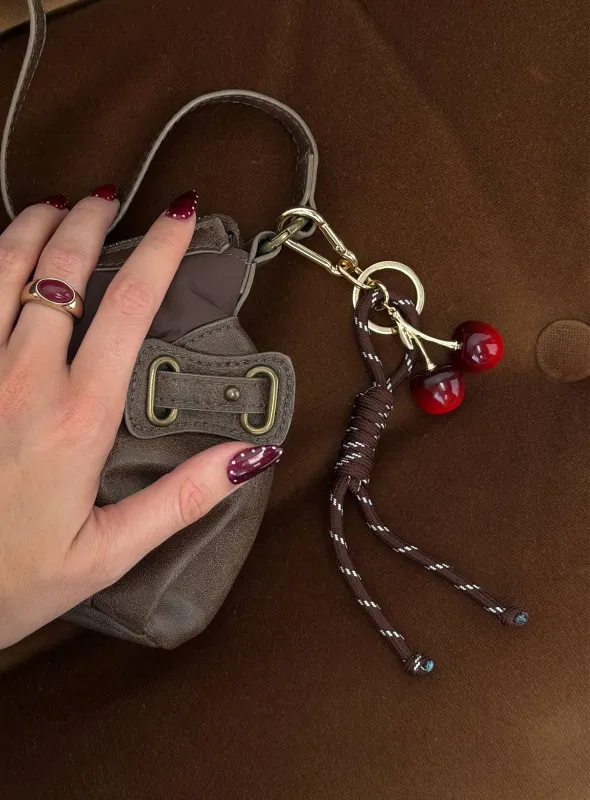 Tell Me More Cherry Keychain Gold sold by Princess Polly