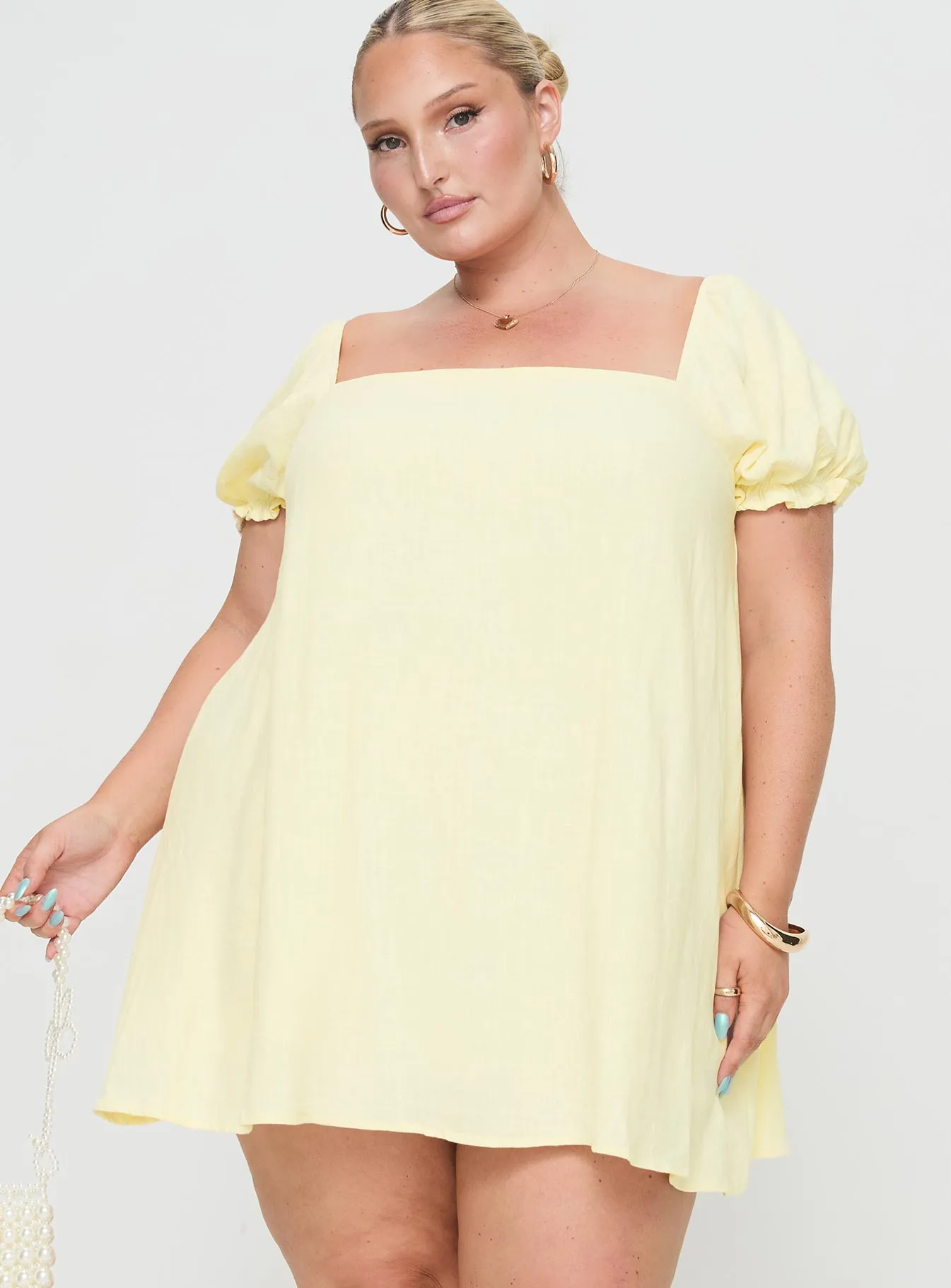 Beyond Linen Blend Mini Dress Yellow Curve sold by Princess Polly