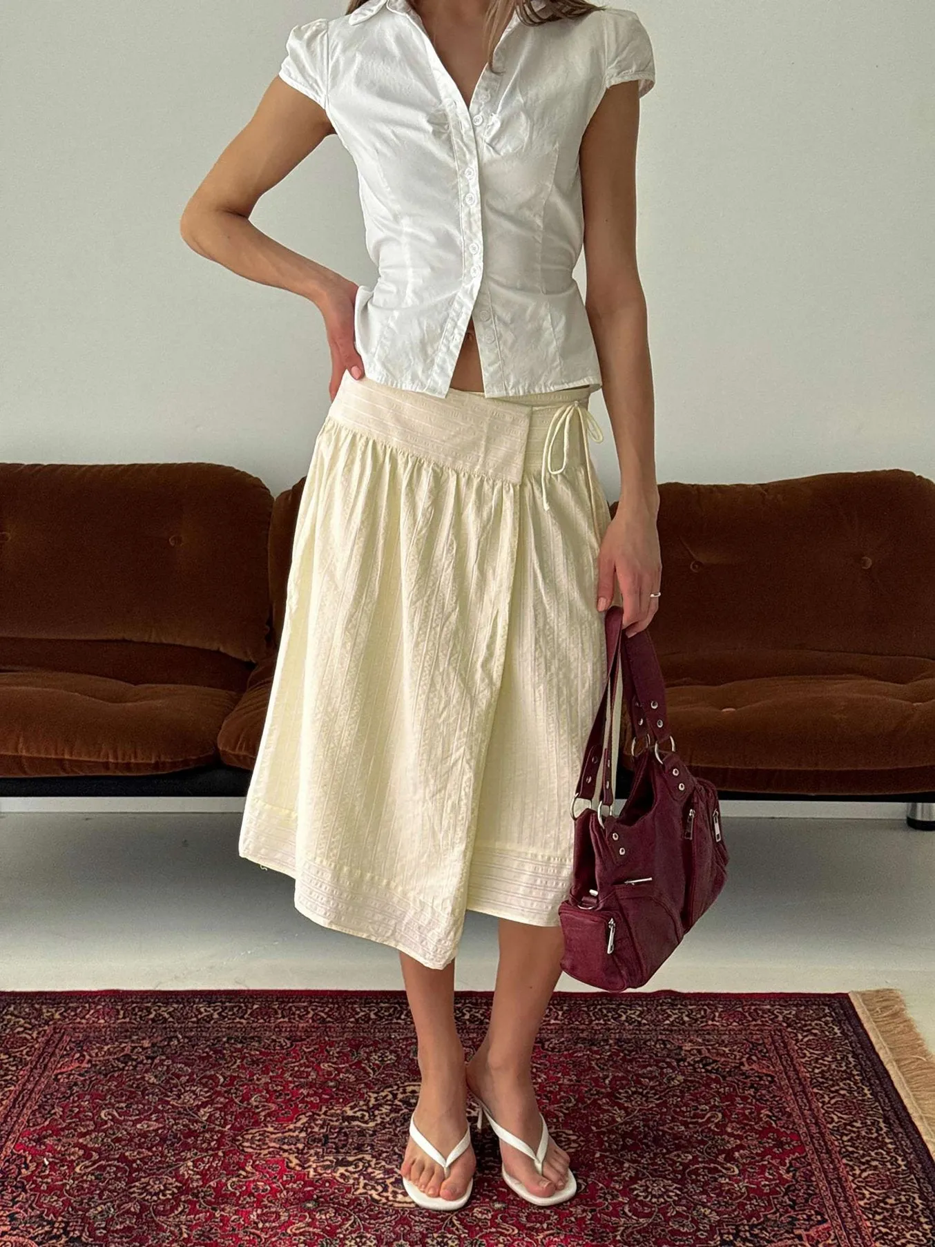 Sunney Wrap Midi Skirt Yellow sold by Princess Polly