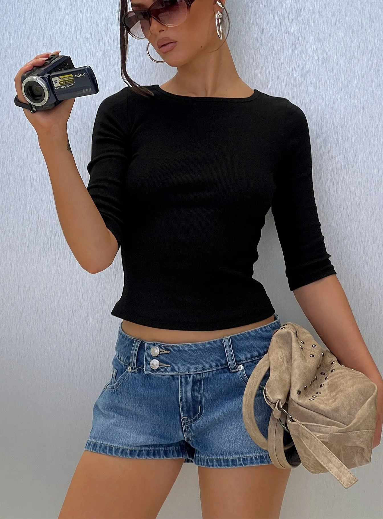 Cruiza Low Rise Micro Denim Short Mid Blue Wash sold by Princess Polly