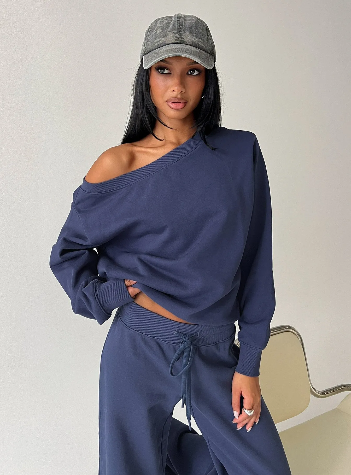 Wellness Off the Shoulder Jumper Navy sold by Princess Polly