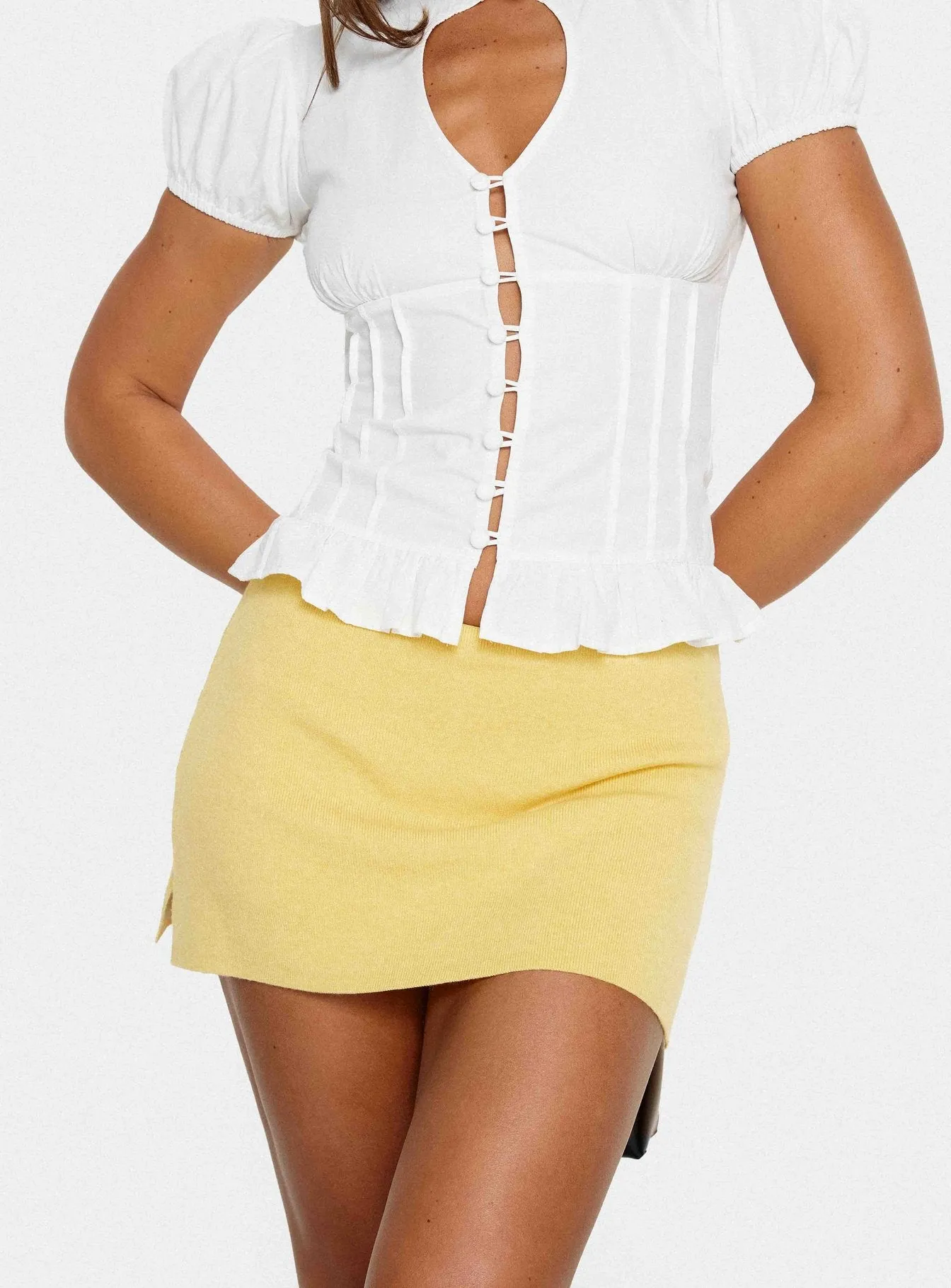 Sparky Mid Rise Skort Lemon Yellow sold by Princess Polly