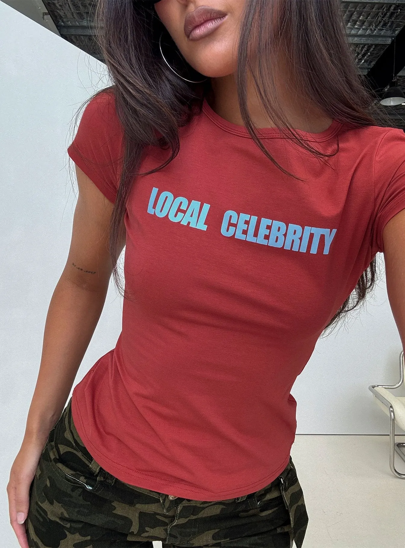 Local Celebrity Graphic Top Washed Red sold by Princess Polly