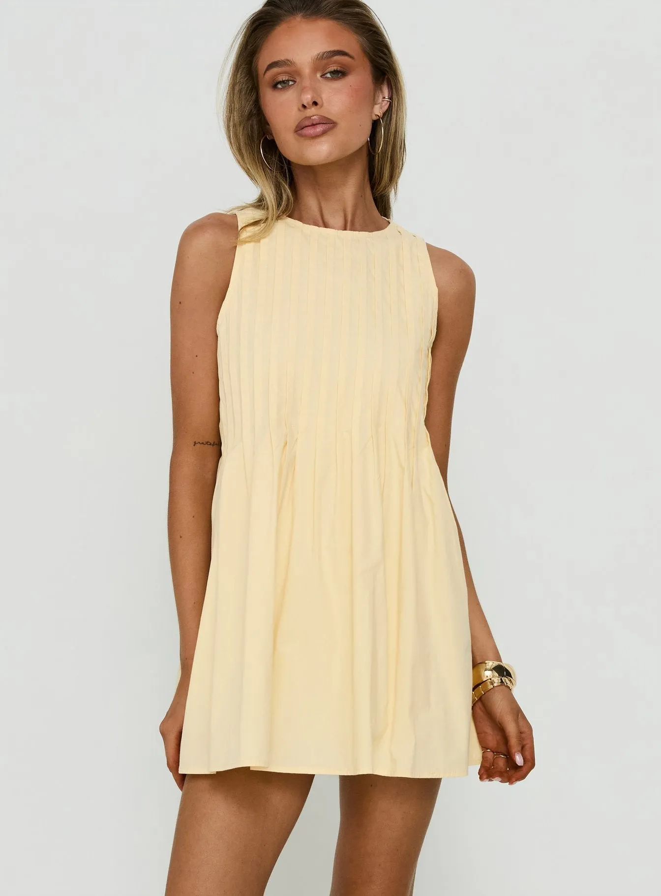 Dreamboat Pleated Mini Dress Yellow sold by Princess Polly