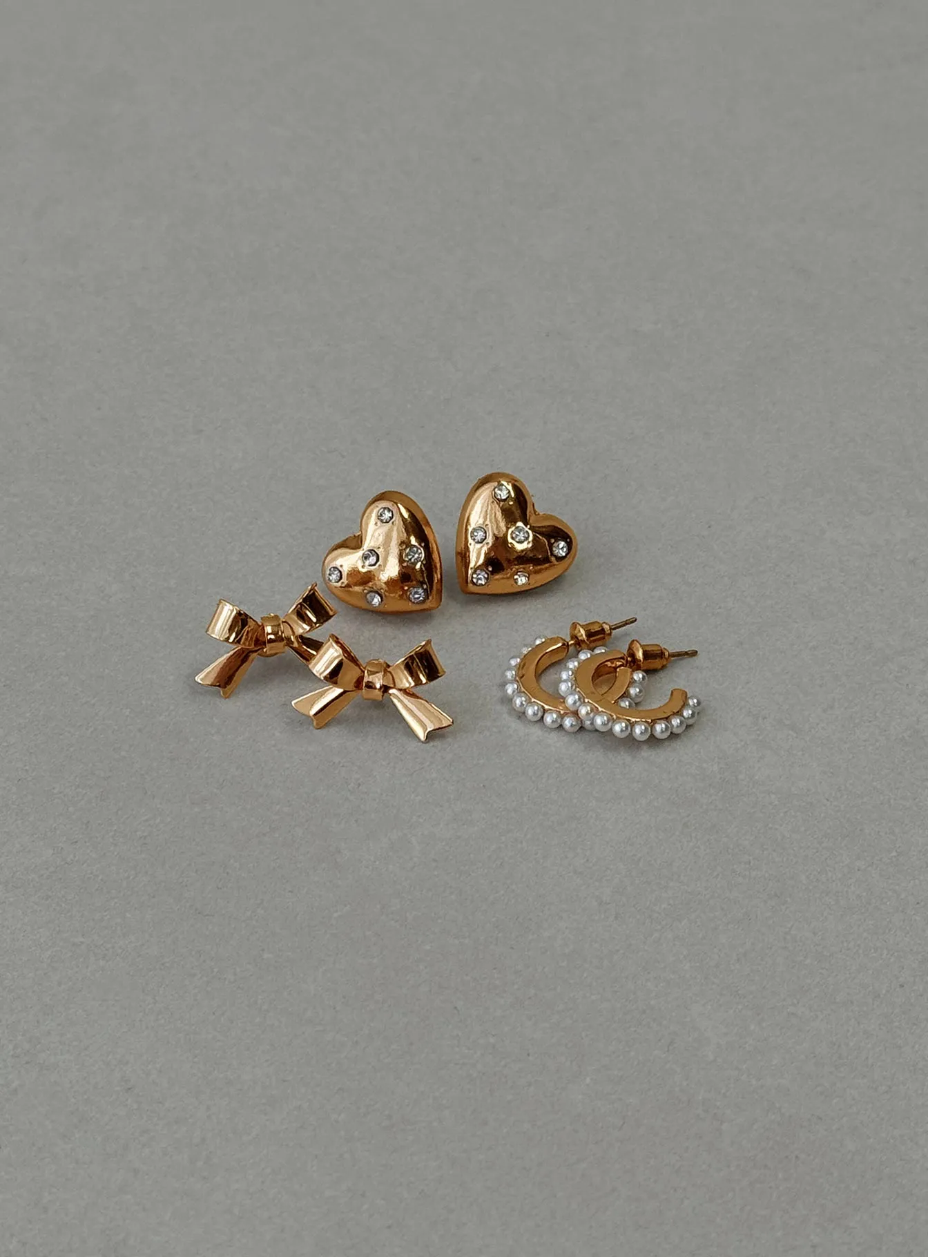 Bows & Hearts Earring Pack Gold sold by Princess Polly