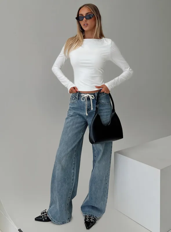 Mellowed Out Low Rise Straight Leg Jeans Mid Blue sold by Princess Polly