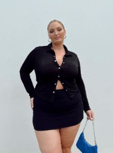 Selby Mini Skirt Black Curve Lower Impact sold by Princess Polly